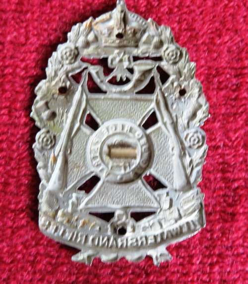 Witwatersrand Rifles white metal badge 1907-1913 never lugged but purpose drilled-really interesting
